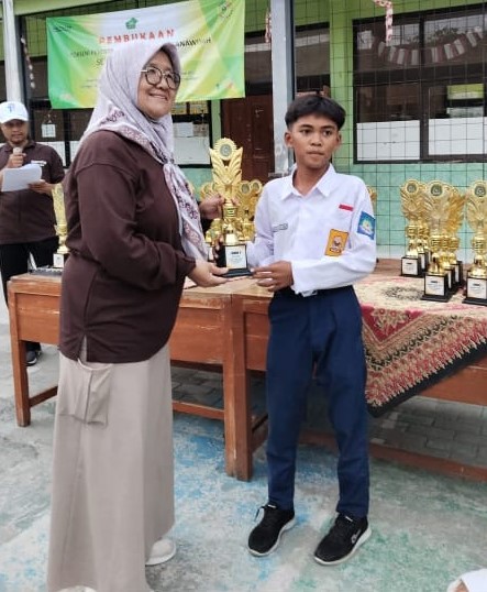 Juara 2 MTQ dalam ajang PORSENI Madrasah KKMTs 1 Wilayah 1 Sumedang